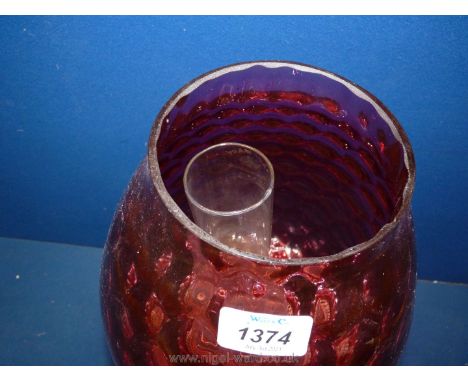 A large church oil heater/lamp on brass base, glass cranberry shade with strawberry pattern, has some damage to shade, 17" ta