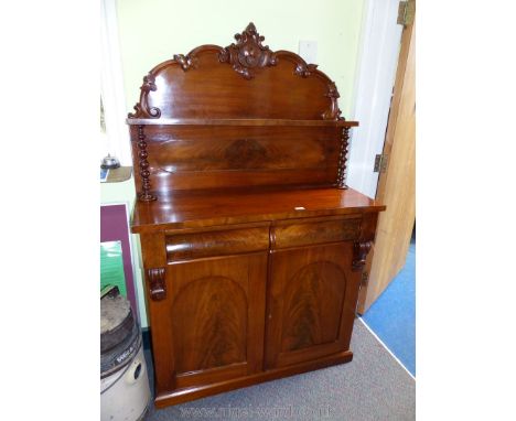 A Victorian Mahogany Chiffonier having a pair of recessed arched doors, two frieze drawers and an upstand featuring a shelf r