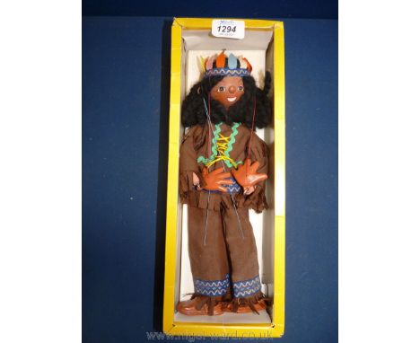 A Pelham Indian boy puppet, in original box, No: SS17.
