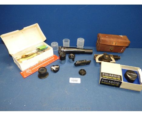 A quantity of miscellanea including three Barlow lenses, Polaroid Development timer '128' micro lens, fishing floats and a le