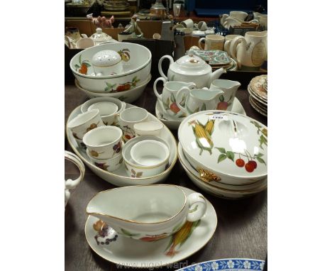 A quantity of Royal Worcester 'Evesham' china including lidded tureens, fruit bowls, ramekins, teapot, jugs, sugar sifter etc