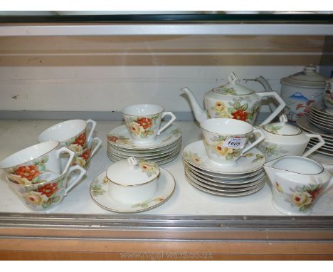 A Noritake tea service with orange and yellow flower pattern including six cups and saucers, six tea plates, lidded sugar bow