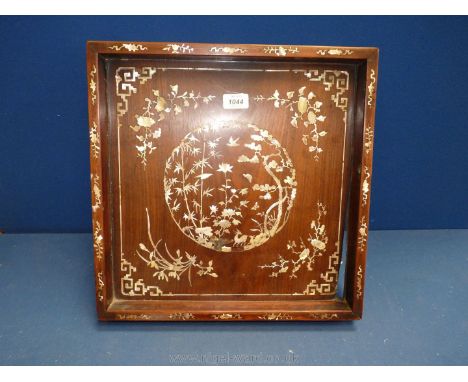 A Chinese wooden Tray profusely decorated with Mother of Pearl inlay depicting flowers, etc. including the outside borders, a