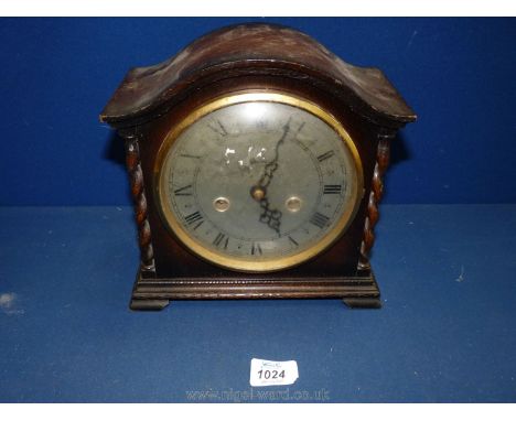 A Smiths Enfield mantle Clock with twist columns, pendulum present, 8 3/4'' high x 9'' wide (no key).