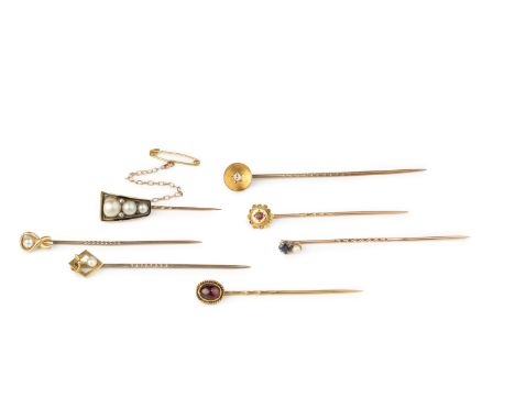 A collection of stick pins, comprising a Victorian diamond set stick pin, the circular panel centred with an old-cut diamond,