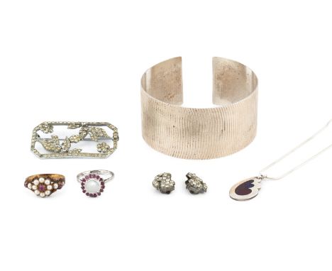 A silver cuff bangle, with textured decoration, together with a gem set dress ring, a moonstone set ring, a silver and enamel