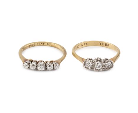 A diamond five stone ring, the graduated old-cut diamonds in claw settings, stamped '18CT PLAT', and a diamond three stone ri