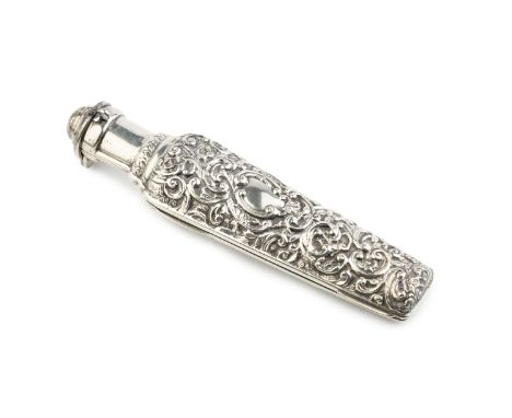 A late Victorian silver scent flask case, repoussé decorated with scrolling foliage, the top and body hinged to reveal the or
