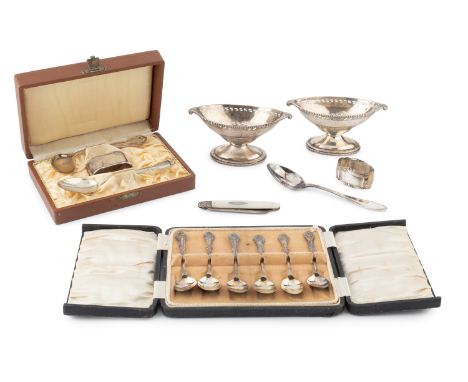 A pair of Edwardian silver boat shaped pedestal salts, by Nathan &amp; Hayes, Chester 1904, 13cm wide, and other silver compr