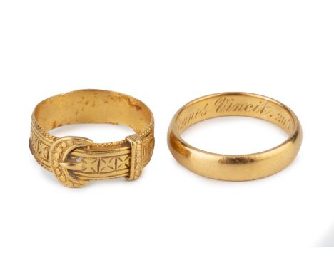 A Victorian 22ct gold buckle ring, with engraved decoration, hallmarked for Birmingham 1868, and a Scottish 22ct gold wedding