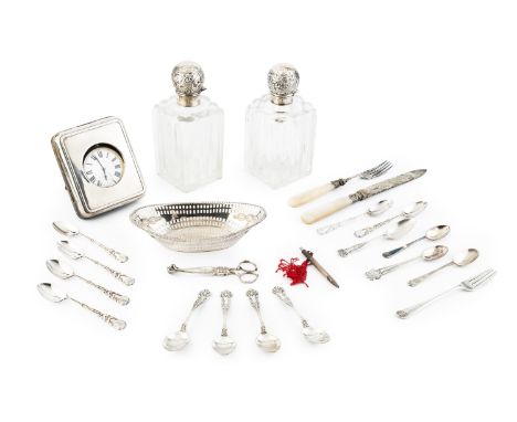 A collection of silver, comprising two late Victorian silver topped glass square section scent bottles, Birmingham 1876, a pi