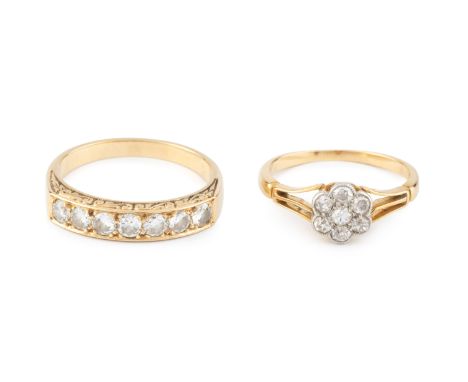 Two diamond dress rings, the first a half hoop ring, inset with a line of round brilliant-cut diamonds, the second a cluster 