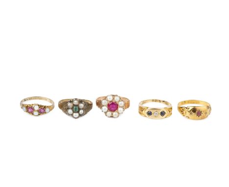 A collection of antique and later dress rings, comprising a sapphire and diamond three stone gypsy set ring, stamped '18', a 
