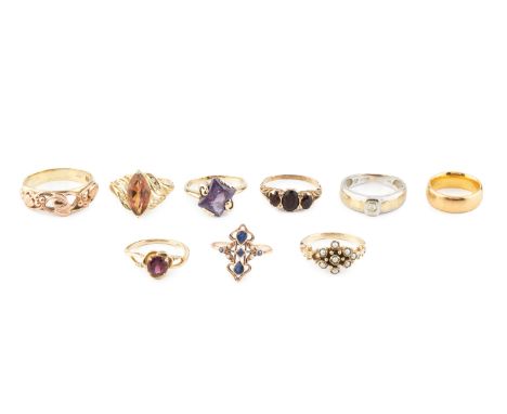 A 9ct two colour gold dress ring by Clogau, of stylised foliate design, together with four stone set dress rings, each 9ct go