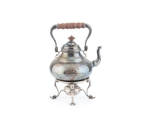 A George V Britannia standard silver tea kettle, of baluster form, with turned hardwood hinged overhead handle by Crichton Br