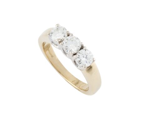 A diamond three stone ring, the round brilliant-cut diamonds in claw setting, 18ct gold mounted, hallmarked for London 2001, 