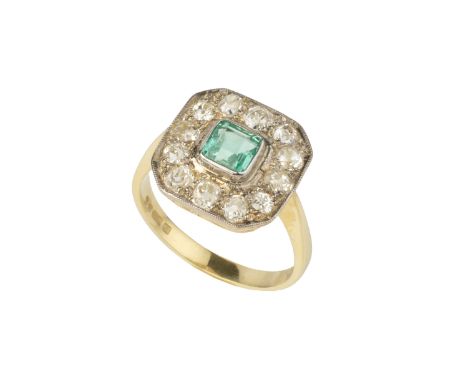 An emerald and diamond cluster ring, of chamfered square design, the step-cut emerald bordered by slightly graduated old-cut 