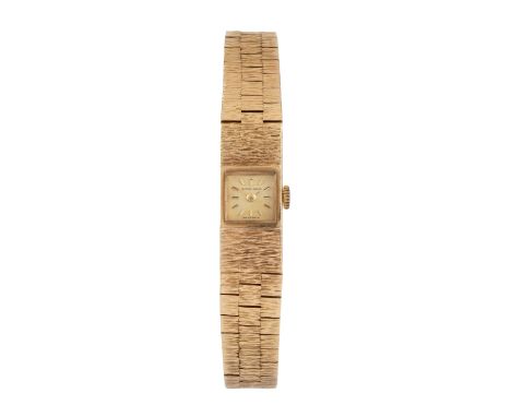 A lady's 9ct gold bracelet watch by Bueche-Girod, the square signed gilt dial with baton numerals, to a manual wind movement,