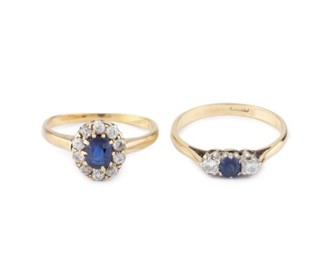 A sapphire and diamond cluster ring, the oval mixed-cut sapphire claw set within an old-cut diamond border, yellow precious m