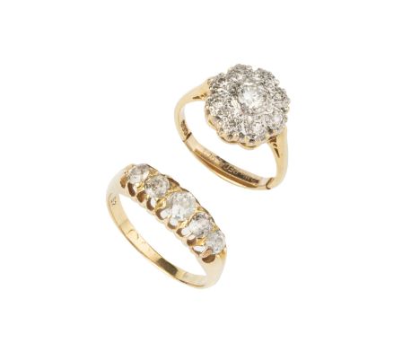 A diamond five stone ring, the graduated old-cut diamonds in claw setting, yellow precious metal mounted (marks worn), and a 
