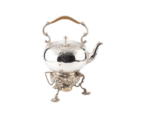 A Victorian silver tea kettle on stand, of globular form, with foliate and scroll engraved decoration and fixed wicker-covere