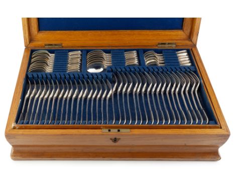 A service of Victorian silver fiddle and thread pattern flatware, comprising 18 table forks, 18 dessert forks, 8 table spoons