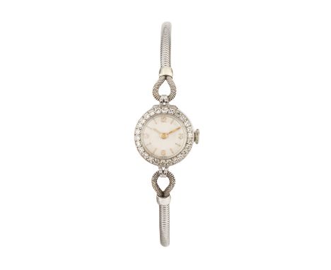 A diamond cocktail watch, the circular silvered dial with gilt Arabic numeral quarters and baton markers, framed by a single-