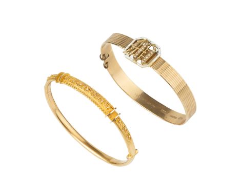 A late Victorian 15ct gold bangle, of hinged oval form, applied with cannetille decoration, hallmarked for Birmingham 1898, a