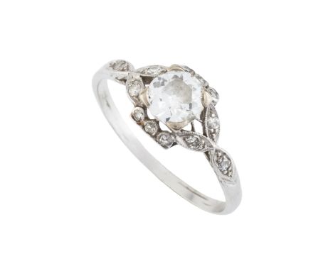 A diamond single stone ring, the old brilliant-cut diamond claw set to a foliate mount accented with graduated single-cut dia