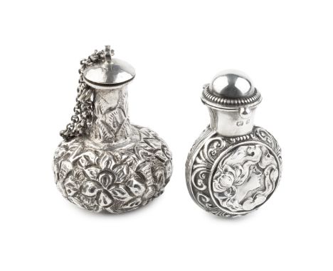 An Edwardian silver scent bottle case, relief decorated with roundels of art nouveau style female portraits, having hinged to