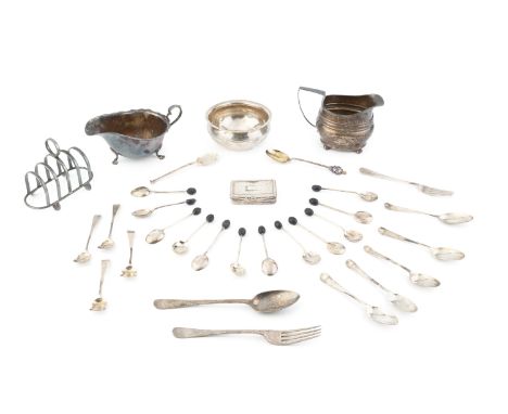 A collection of silver, comprising a 19th century cream jug, a sauce boat, a five bar toast rack, a sugar bowl, a 19th centur
