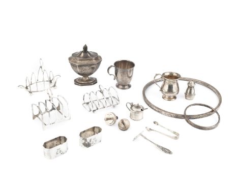 A George V silver urn shaped tea caddy, by Thomas Bradbury &amp; Son, Sheffield 1918, 13cm high, and a collection of further 