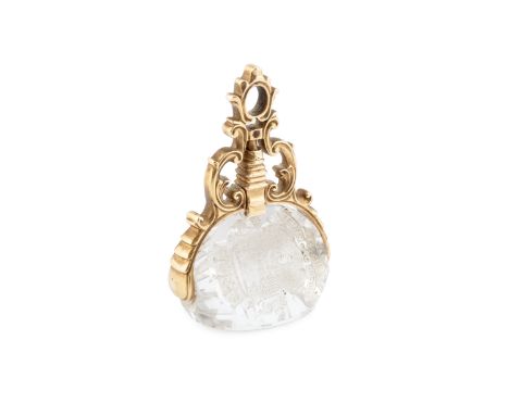 A 19th century rock crystal swivel fob seal, intaglio engraved to two sides with crests and motto, with scrolling foliate mou