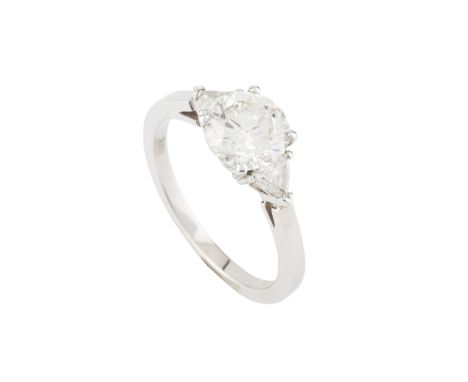 A diamond three stone ring, the principal round brilliant-cut diamond claw set between two triangular brilliant-cut diamonds,