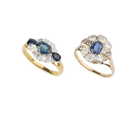 A sapphire and diamond dress ring, set with three graduated oval mixed-cut sapphires, the central sapphire within a diamond b