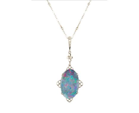 An opal doublet and diamond pendant, white metal mounted, suspended from a trace-link chain, pendant length 4.5cm