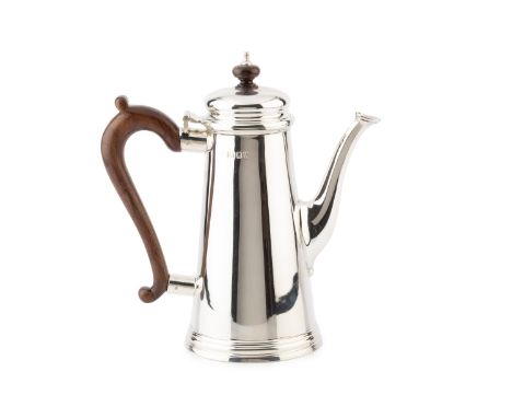 A silver coffee pot, of plain, tapering form, with hinged domed cover and having hardwood handle and knop by William Comyns &
