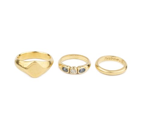 A sapphire and diamond three stone ring, the old-cut diamond collet set between two oval mixed-cut sapphires, yellow precious