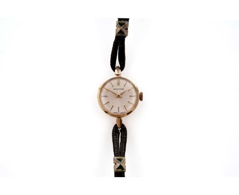 A Garrard 9ct gold cased manual wind cocktail watch, the silvered circular dial with gilt baton hour markers, on black strap.