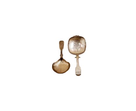 A Victorian silver Fiddle pattern caddy spoon with a waisted bowl, initialled 'S' by William Smily, London 1860; and a silver