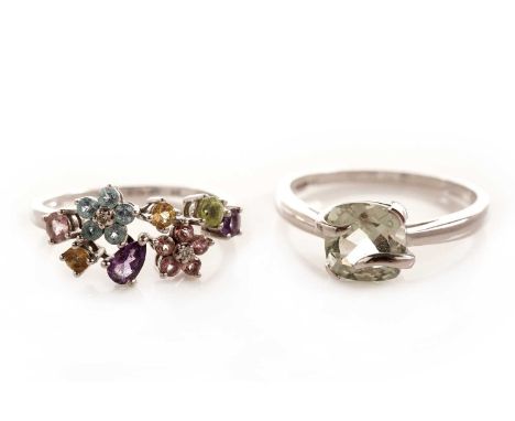 A diamond and coloured stone flower cluster ring, in white gold, stamped "9K", size R, 2.2g gross; and a single stone dress r
