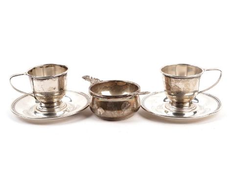 An Elizabeth II silver tea sieve and stand, by Henry Clifford Davis, Birmingham 1959, 2.2oz gross; and a pair of Lord Saybroo
