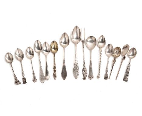 A selection of British and International silver spoons, including: a Bern bear pattern 800 standard silver souvenir spoon; a 
