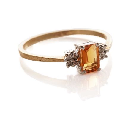 A fire opal and diamond ring, the rectangular step cut fire opal flanked by round brilliant cut diamonds, in white gold setti