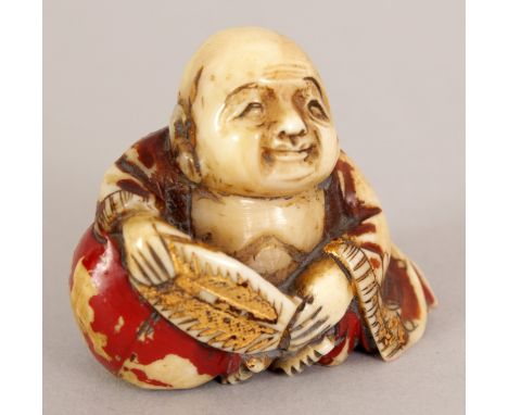 A JAPANESE LACQUERED & GILDED IVORY NETSUKE OF HOTEI, seated resting on his bag and holding a fan, 1.4in wide & 1.25in high.