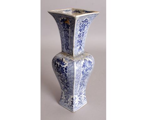 A CHINESE KANGXI PERIOD BLUE & WHITE PORCELAIN VASE, circa 1700, the sides of the square-section yen-yen form body painted wi