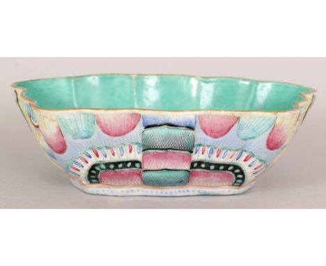 A 19TH CENTURY CHINESE TONGZHI MARK & PERIOD FAMILLE PORCELAIN BUTTERFLY BOWL, of butterfly form, the sides painted with styl