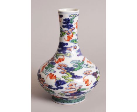 A CHINESE DOUCAI PORCELAIN BOTTLE VASE, the sides decorated with bats amidst cloud scrolls, the base with a Qianlong seal mar