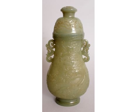 A GOOD QUALITY 19TH CENTURY CHINESE DARK CELADON GREEN JADE VASE & COVER, with scroll handles, the sides carved in low relief