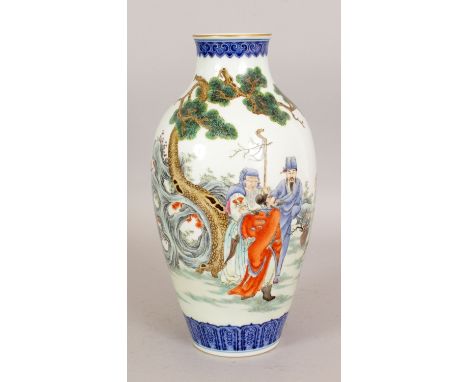 A GOOD QUALITY CHINESE FAMILLE ROSE PORCELAIN VASE, decorated with a group of Immortals conversing in a garden setting of roc